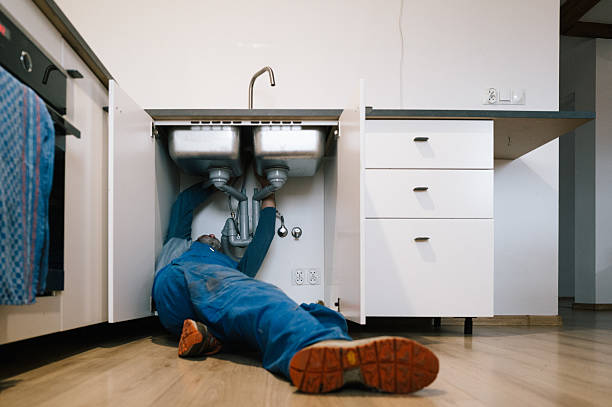 Professional Drain Cleaning technician working in Lake City, MN